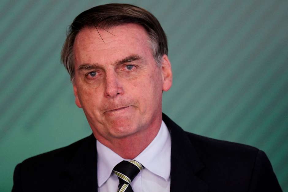 Resultado de imagem para Bolsonaro diz em Davos esperar que governo da Venezuela mude 'rapidamente'