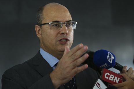 O governador do Rio de Janeiro, Wilson Witzel, fala à imprensa após reunião com o presidente da República, Jair Bolsonaro, no Palácio do Planalto.