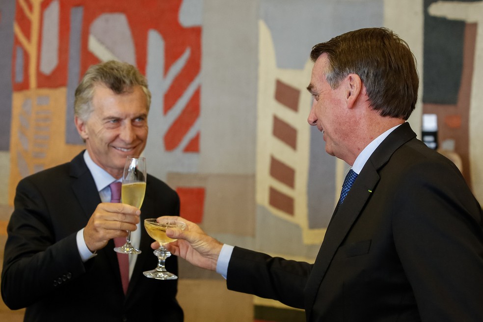 Mauricio Macri e Jair Bolsonaro, durante um brinde no Palácio Itamaraty, em BrasÃlia, em janeiro deste ano â?? Foto: Isac Nóbrega/PR
