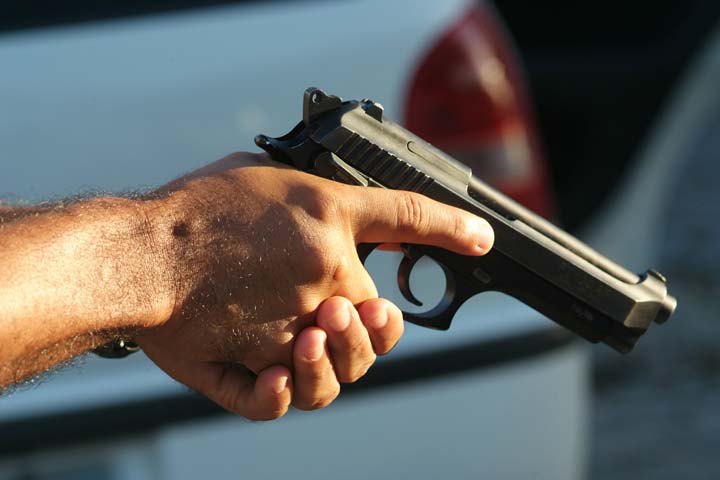 Resultado de imagem para fotoss de tiros com arma de fogo
