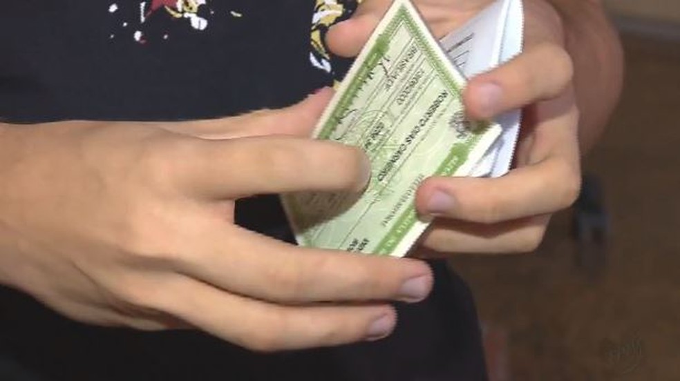 Segunda via do tÃtulo de eleitor deve ser solicitada até 27 de setembro para quem está no domicÃlio eleitoral. (Foto: Reprodução/EPTV)