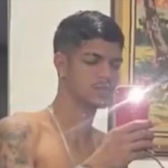 jovem morto a tiros