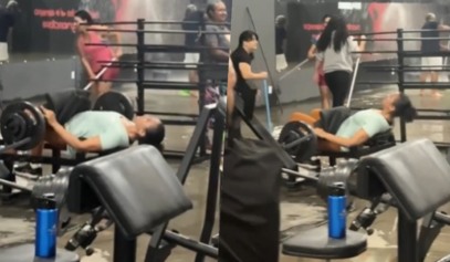 mulher em academia alagada