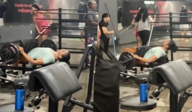 mulher em academia alagada